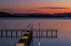 Dock at dawn on Flathead Lake in Polson, Montana, USA. Art Print